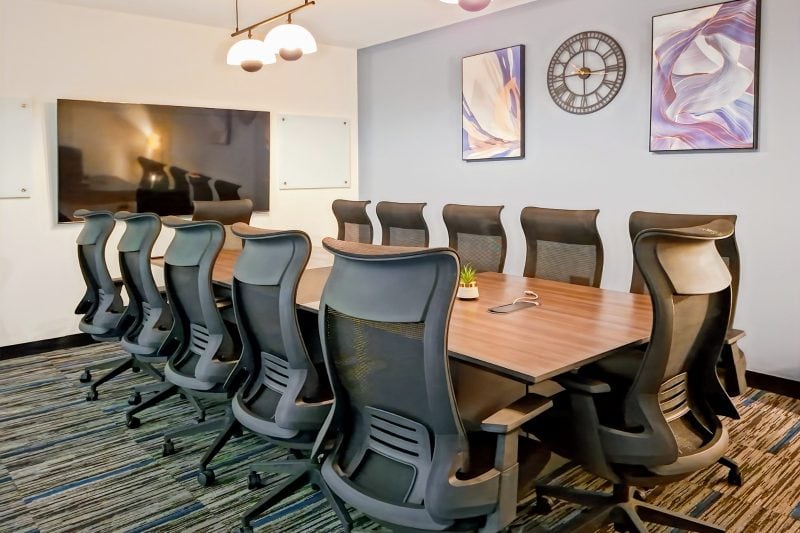 Ten-seater boardroom with wall screen at HQ Mombasa serviced offices, Nyali