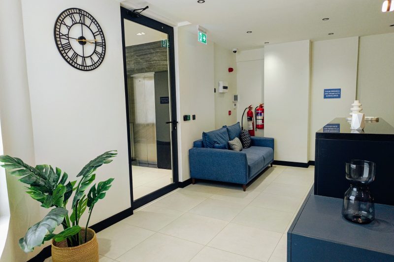 Lift lobby and visitor waiting area at HQ Mombasa, City Mall Nyali